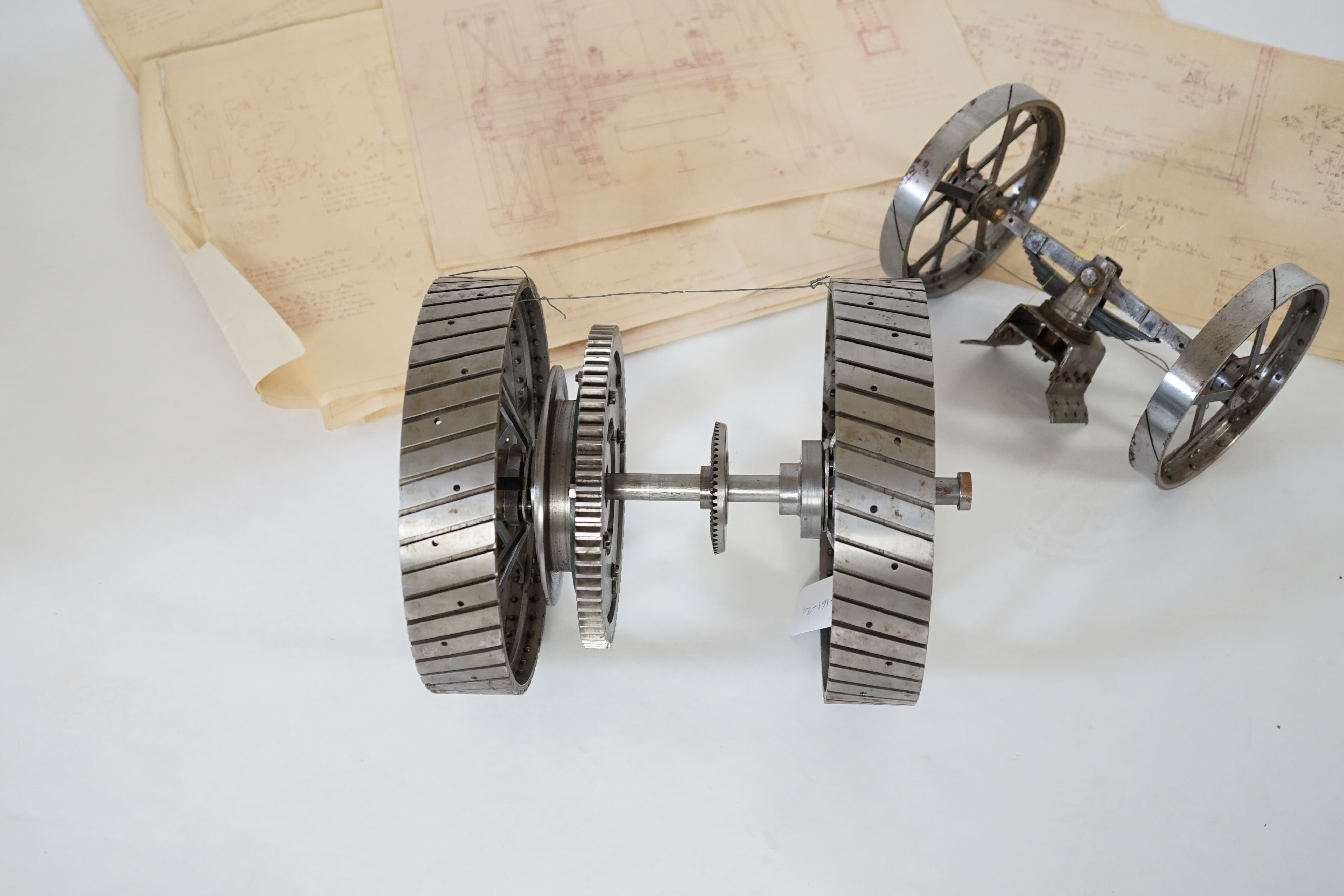 A partially constructed kit comprising of the major components of machined and cast parts to build a two inch scale live steam Ransomes 4 N.H.P. traction engine, including a set of drawings
